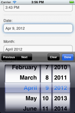 Date spinner control replaces standard keyboard on iPhone.